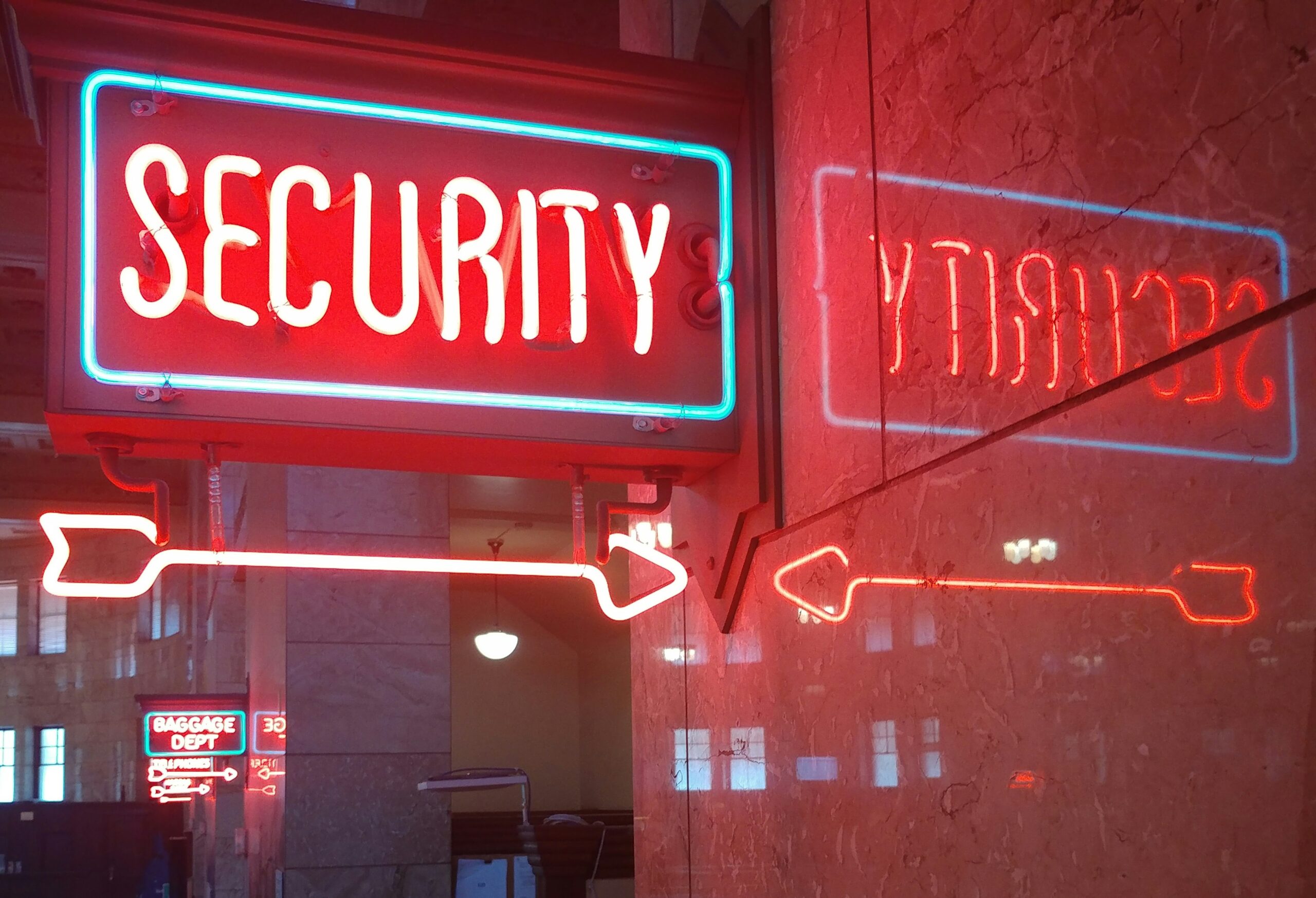 Stressed employee dealing with AI-powered phishing emails